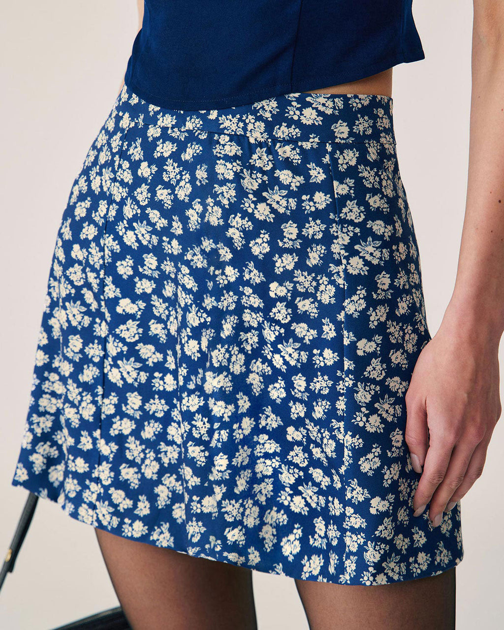 Florelle – Falda mini en A con estampado floral en azul marino