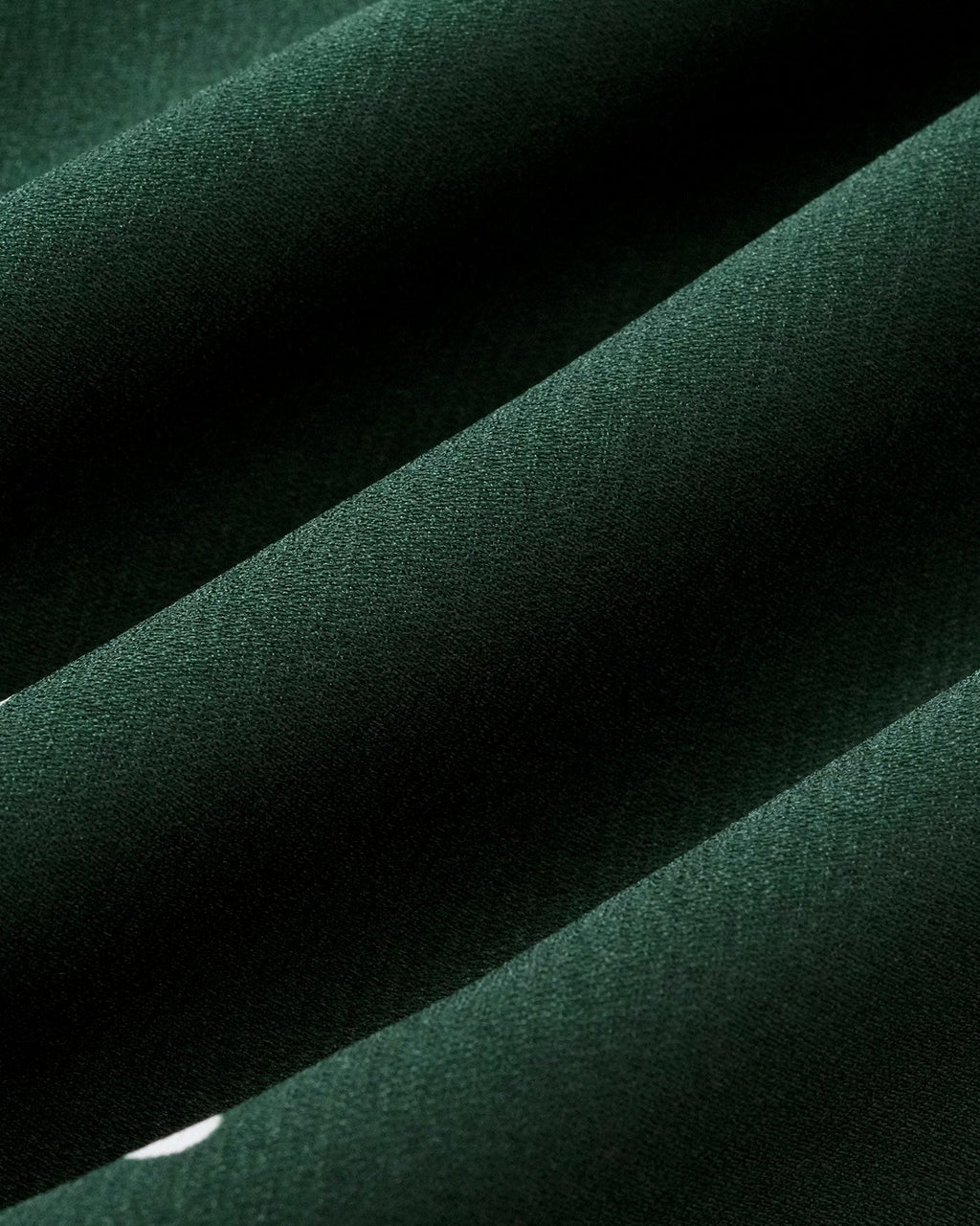 Mini vestido de punto verde con escote en V