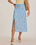 Falda midi A con estampado de flores azules y aberturas laterales