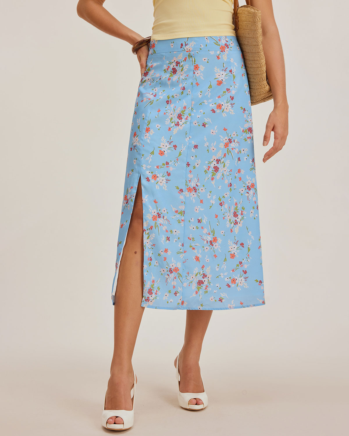 Falda midi A con estampado de flores azules y aberturas laterales