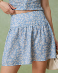 Aveline – Mini falda en corte A con estampado de flores azules