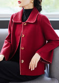 Abrigo rojo de lana con cuello y bolsillos