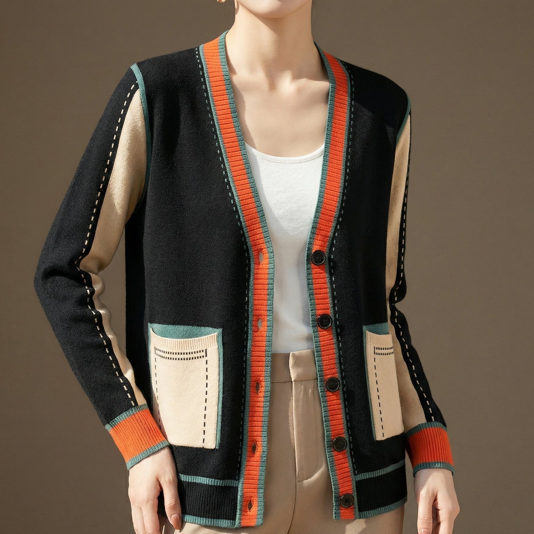 Elena – Suéter de Colores Contrastantes con Bolsillos