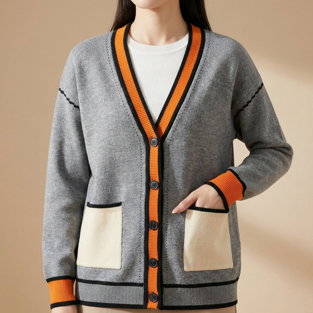Elena – Suéter de Colores Contrastantes con Bolsillos