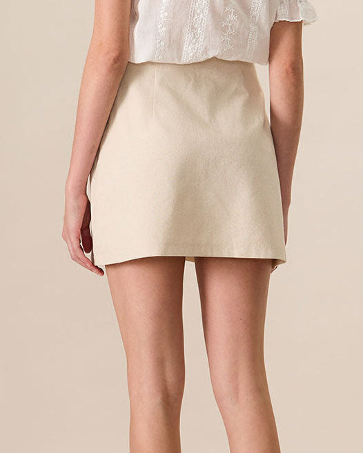 Elegante mini falda con botones