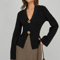 Luna – Suéter negro con botones ornamentales