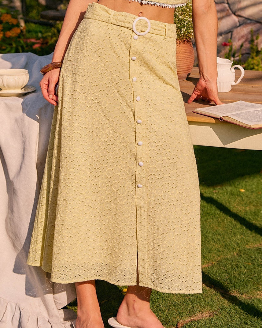 Solena – Falda midi amarilla con bordado y botones