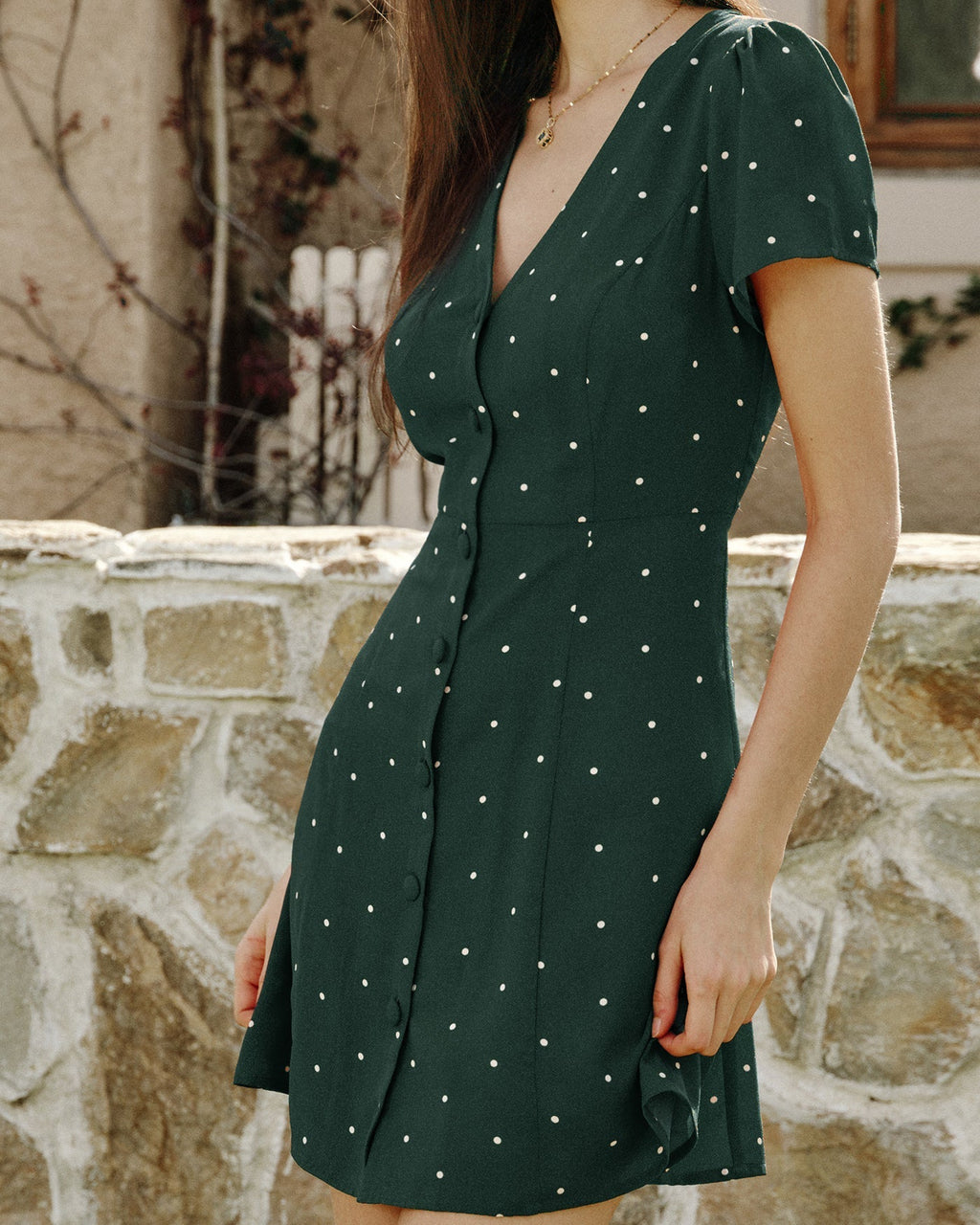 Mini vestido de punto verde con escote en V
