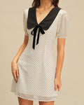Vestido mini de lunares en contraste
