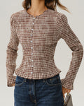 Amora – Camisa de cuadros con mangas abullonadas
