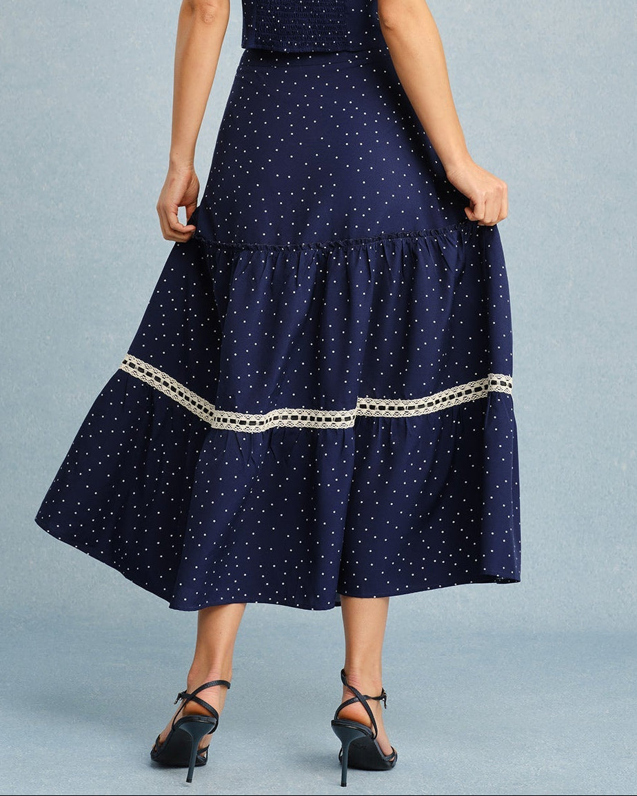 Santorini – Falda midi de lunares en azul marino